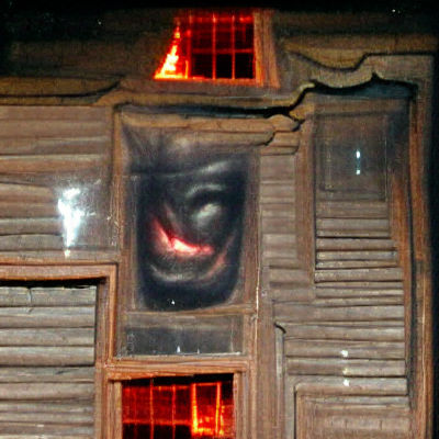 Eerie Demon Face Appears in Haunted House Window