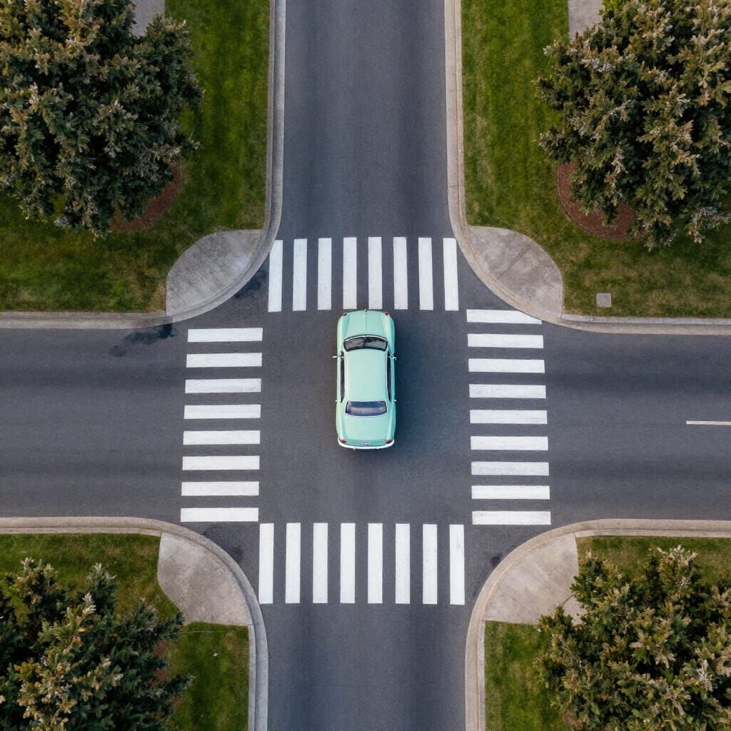 Aerial Drone View of Residential Intersection with Vintage C...