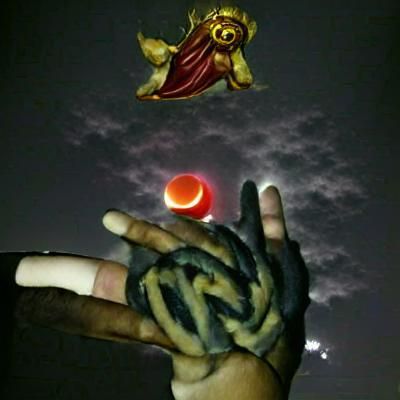 Dramatic Red Moon Eclipse with Divine Hand
