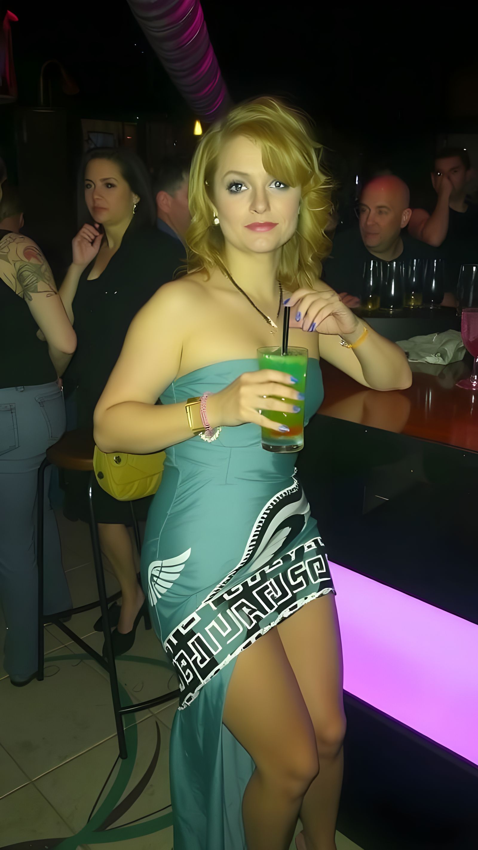 Vintage Woman Smizes in a 90s Tavern