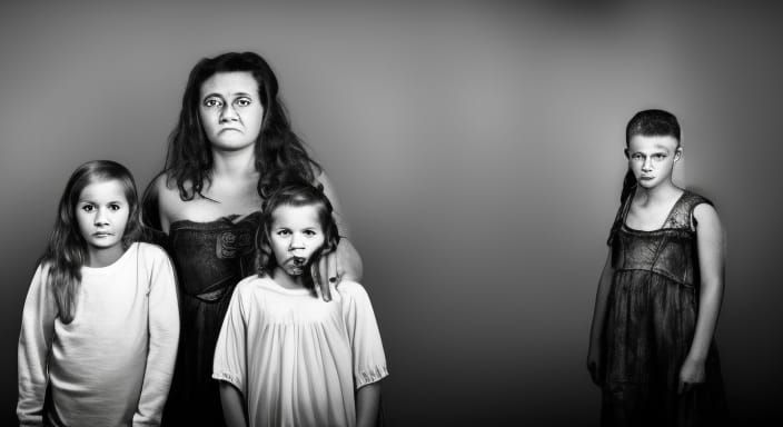 Intricate Black and White Family Portrait in Haunted House