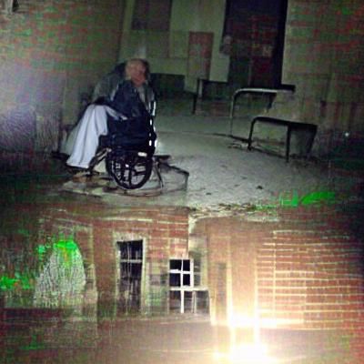 Creepy Old Man in Abandoned Asylum with Flashlight