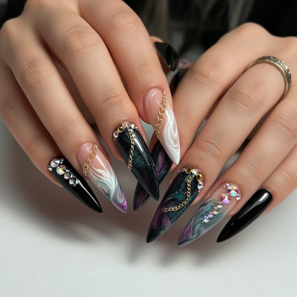 Edgy Stiletto Nail Art with Gold Chains and Rhinestones