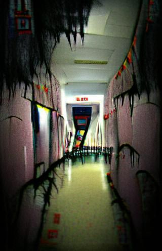 Eerie Perspective of a Long, Dark Hallway