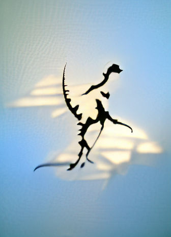 Dinosaur Silhouette in Flight