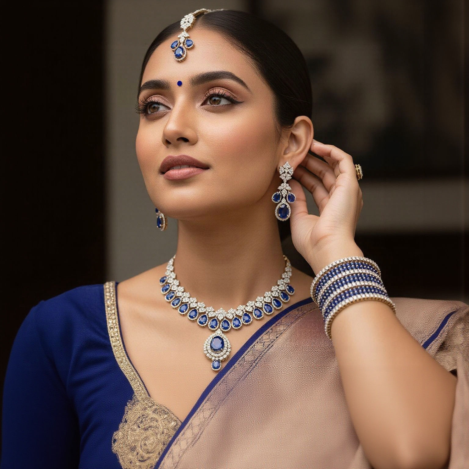 Elegant Indian Woman Adorned with Sapphire Jewelry