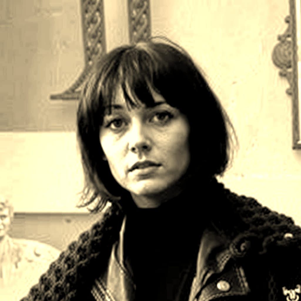 Goth Model in Coffee Shop with Rusted Sculptures