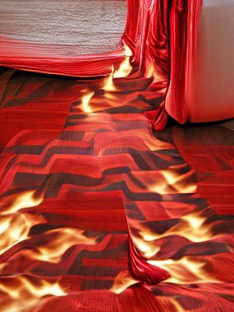 Surreal Scene with Chevron Floor and Red Curtains