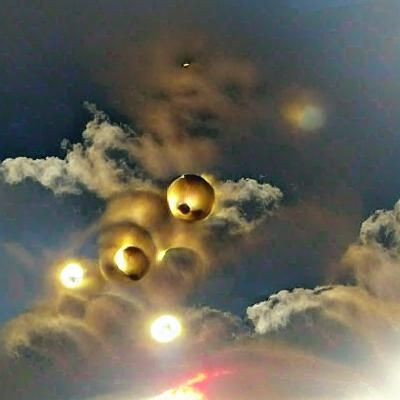 Celestial Golden Orbs Illuminate the Sky
