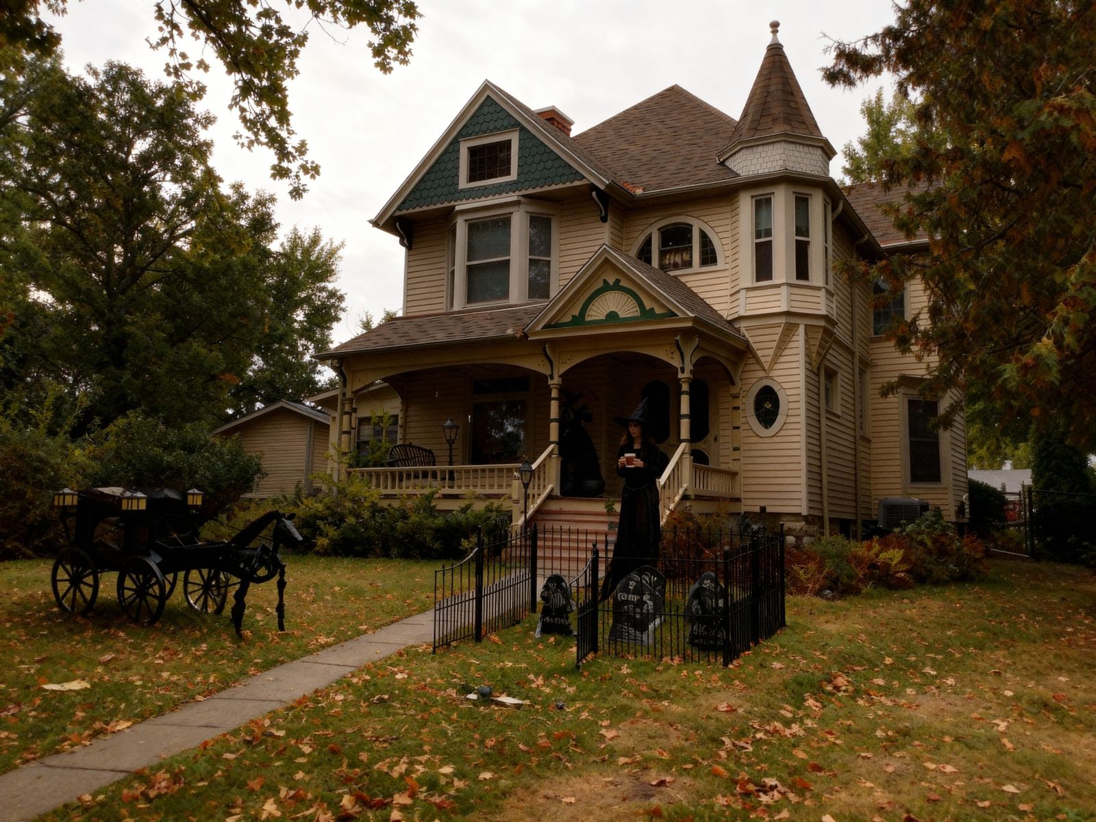 Witch Enjoys Coffee on Spooky Halloween Mansion Porch