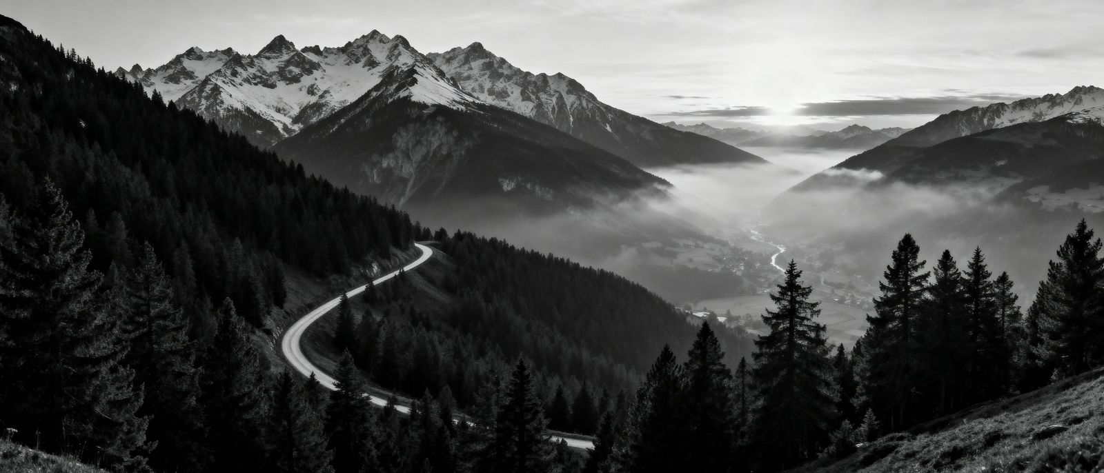 Snow-Capped Alpine Peaks at Dawn with Winding Path