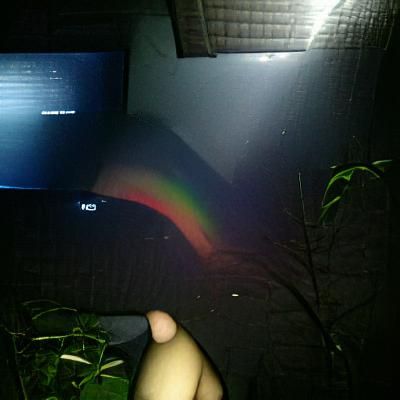 Rainbow Spectrum Against Dark Backdrop