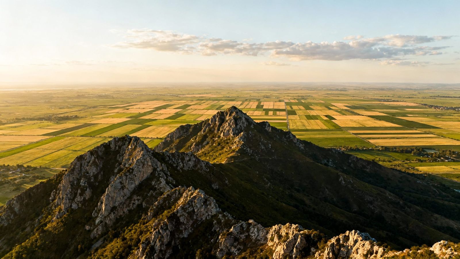 Mountain Vista Over Farmland Landscape