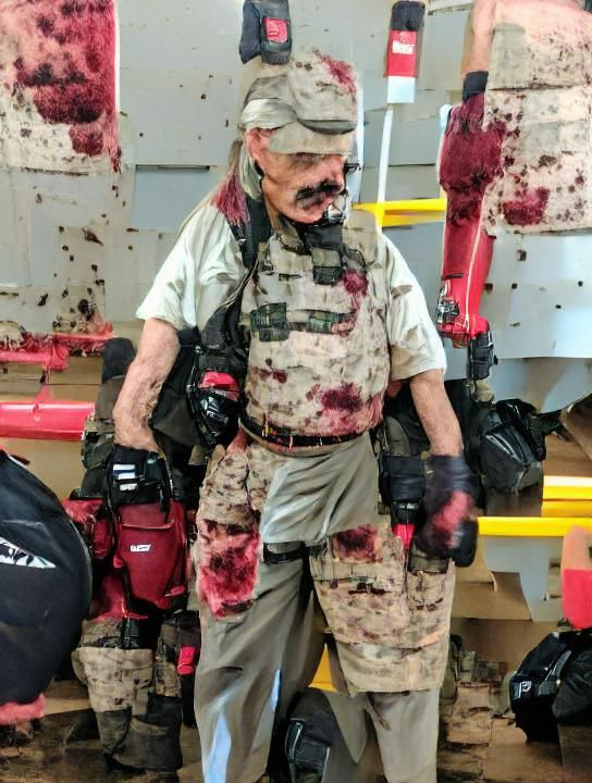 Bloody Retired Military Man in Tactical Gear