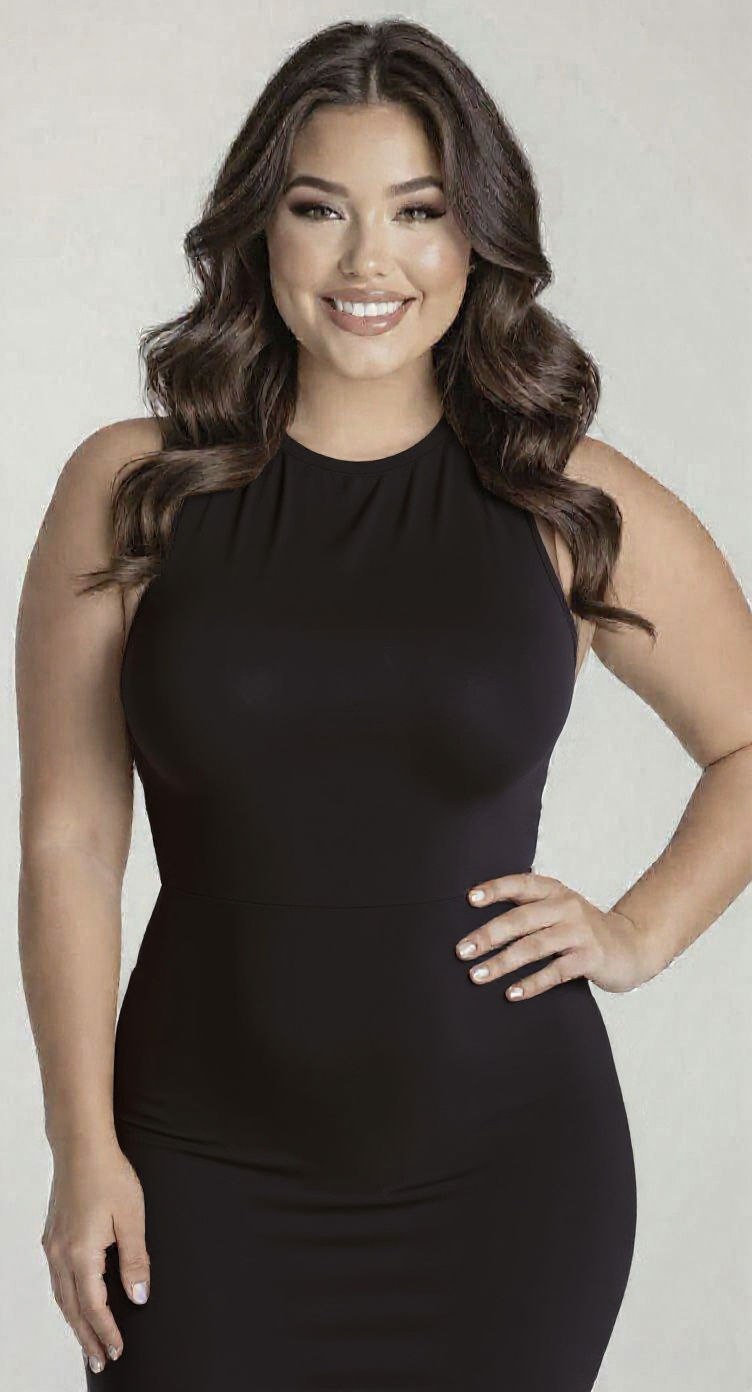 Confident Young Woman in Modern Bold Dress