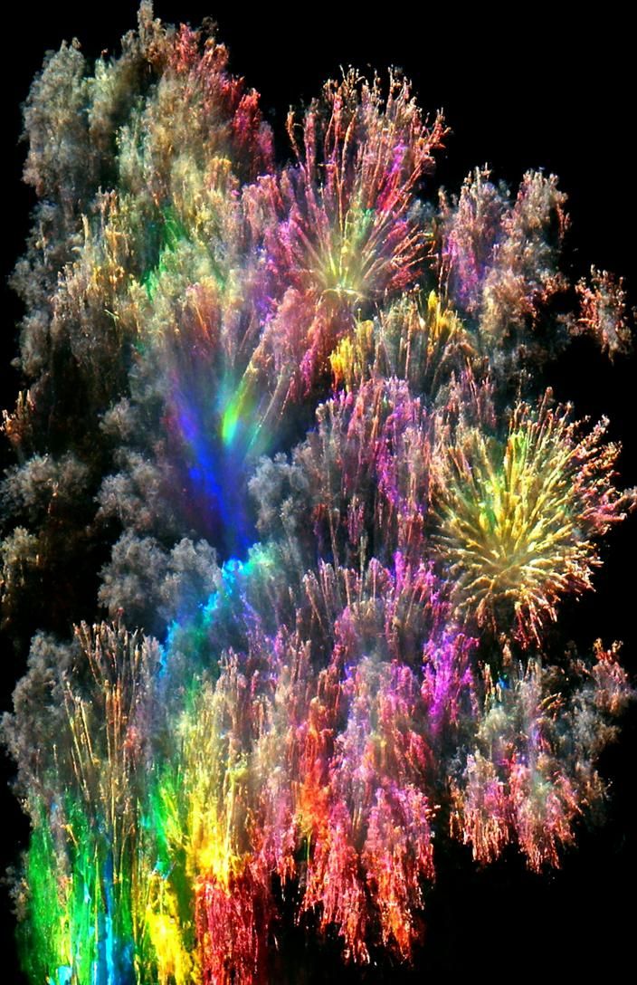Colorful Rainbow Fireworks over Waterfront in 8k