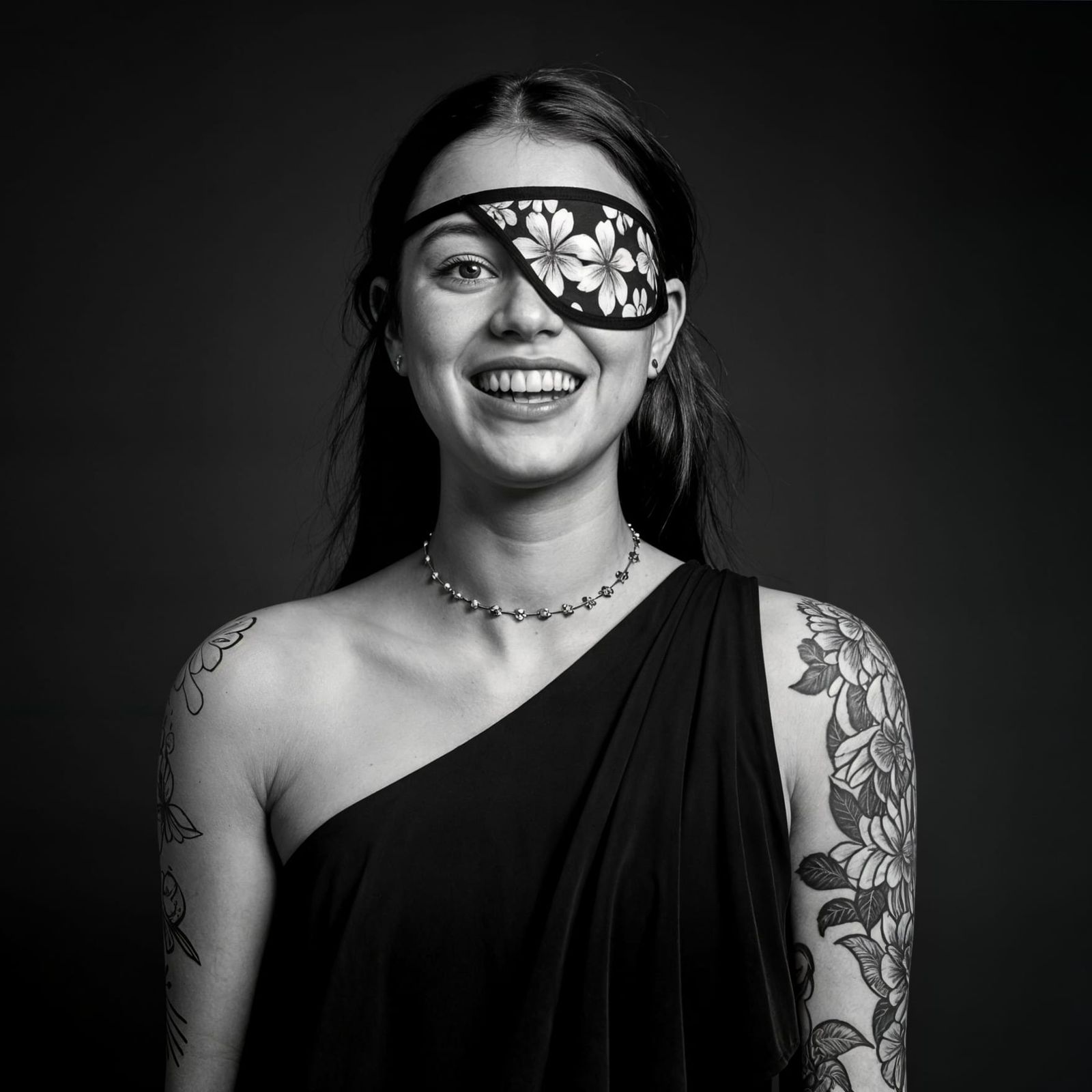 Elegant Young Woman in Hawaiian Flower Eyepatch and Tattoos,...