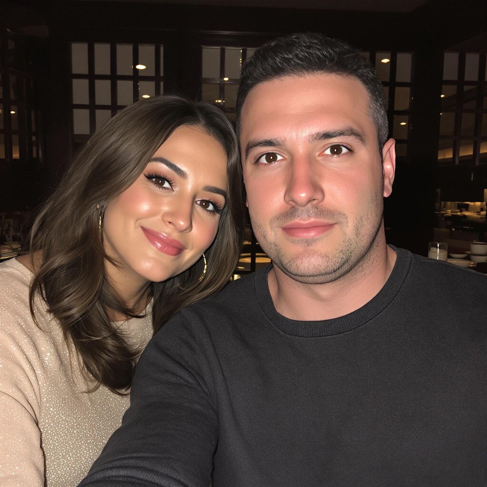 Romantic Couple Shares a Moment of Intimacy in a Cozy Restau...