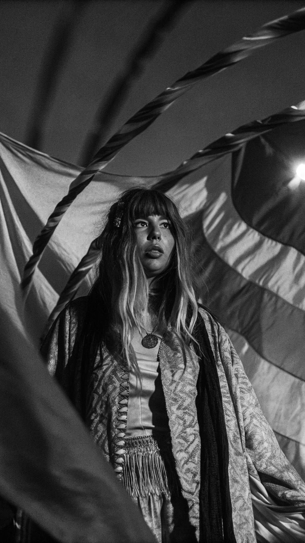 Enchanting Bohemian Lady Under Vibrant Festival Lights