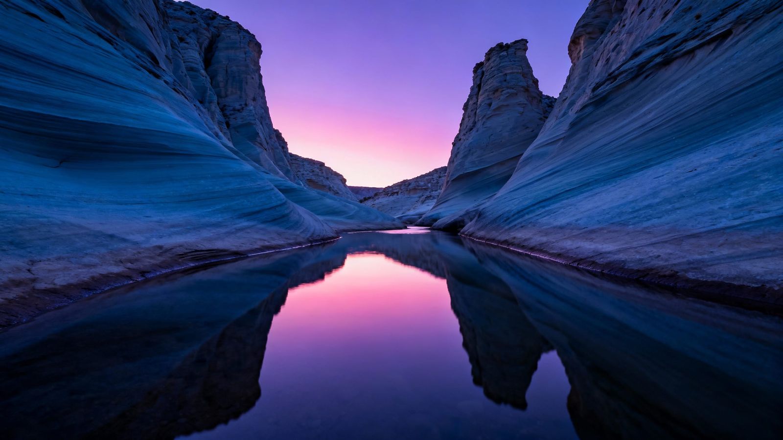 Twilight Canyon Serenity: Flowing Rock Formations and Reflec...