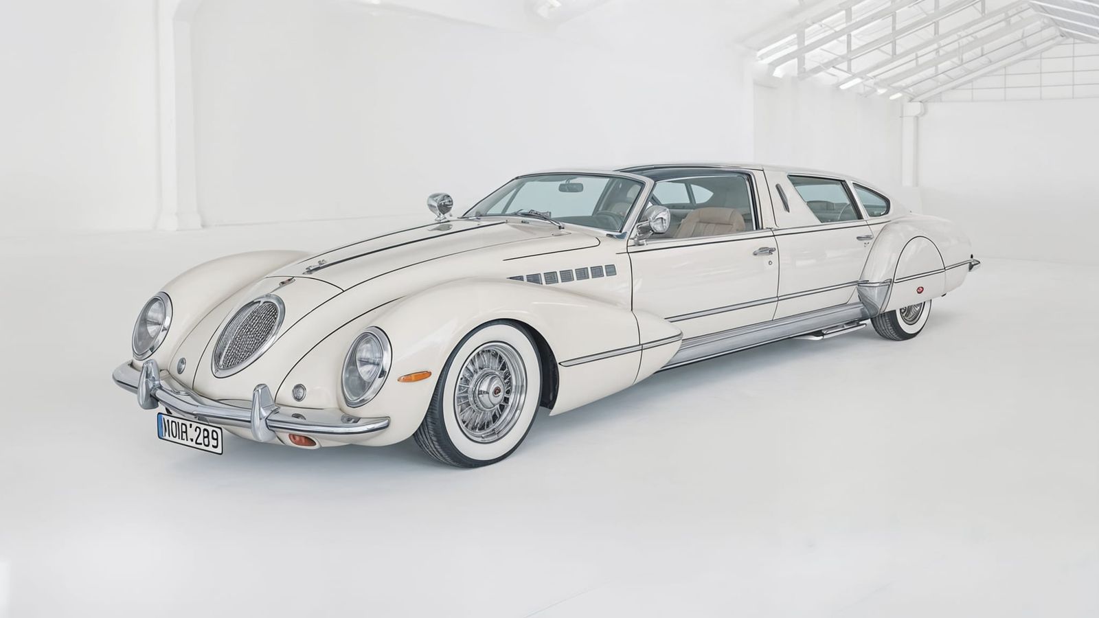 Retrofuturistic Limousine in Aviation Hangar