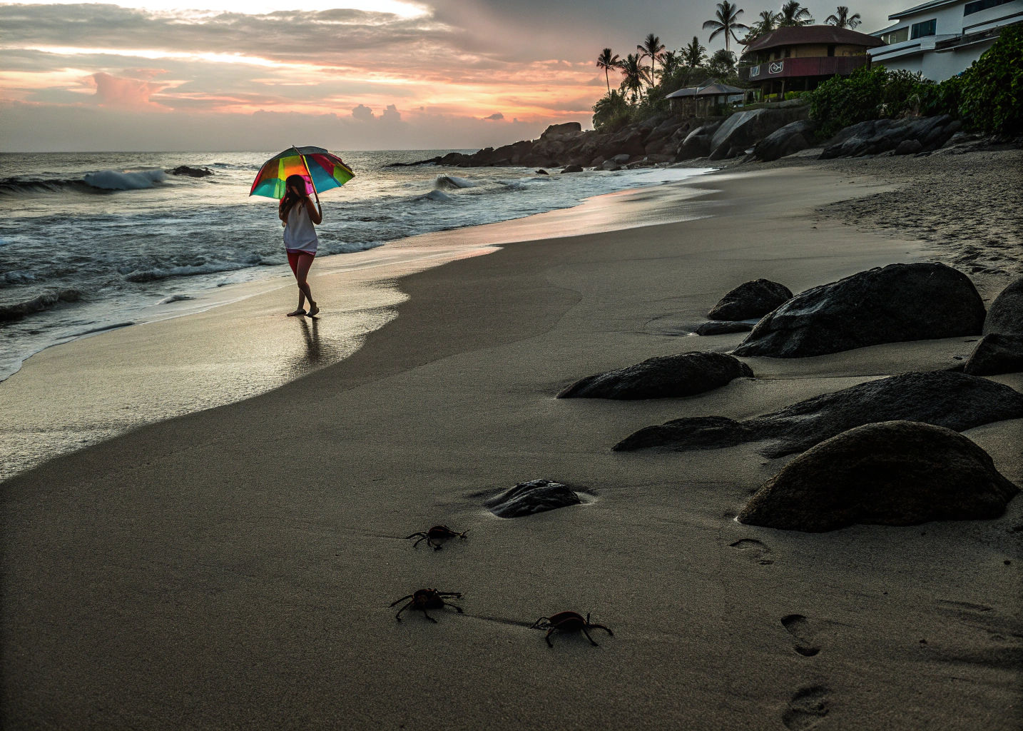 Girl with Rainbow Umbrella on Sunset Beach