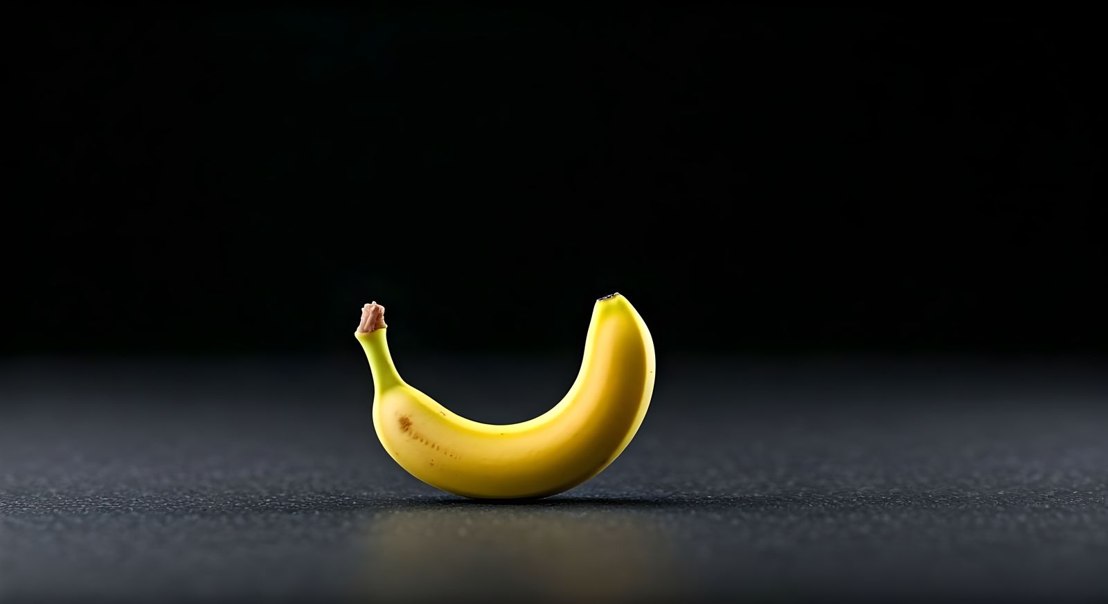 Tiny Nano Banana on Black Background