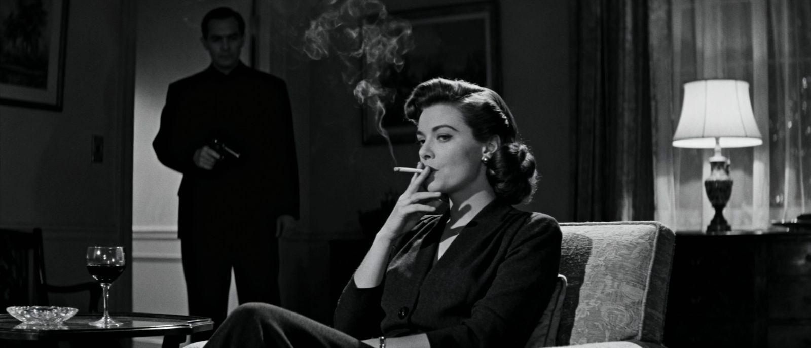 1940s Woman Watched By Shadowy Figure