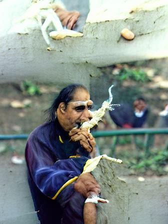 Man Smoking a Joint in Deep Thought