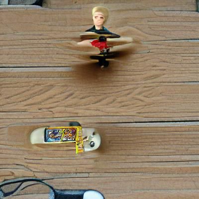 Tech Deck Flying Over Angry Ken Doll