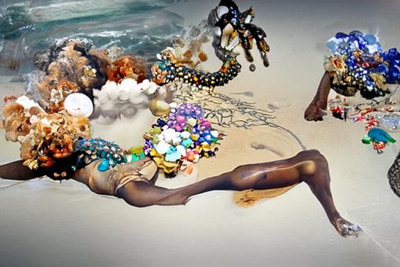 Surreal Woman on Beach with Jewels and Glitter