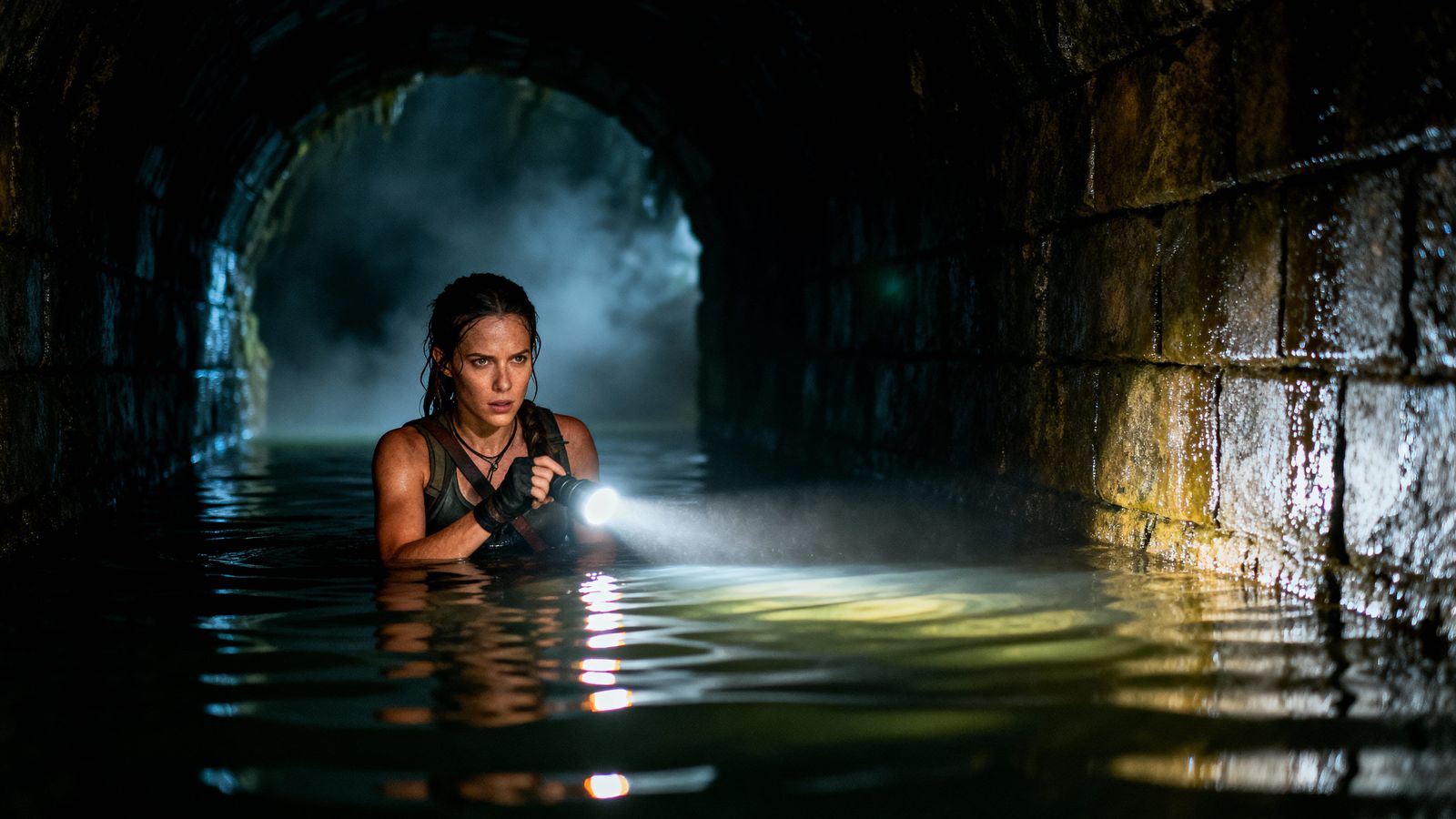Lara Croft Explores Dark Underground Tunnel