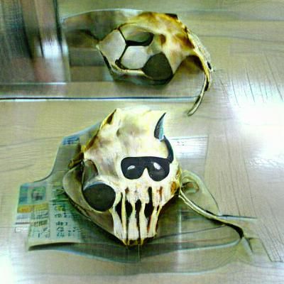 Stylized Skull Mask in Dark Digital Art