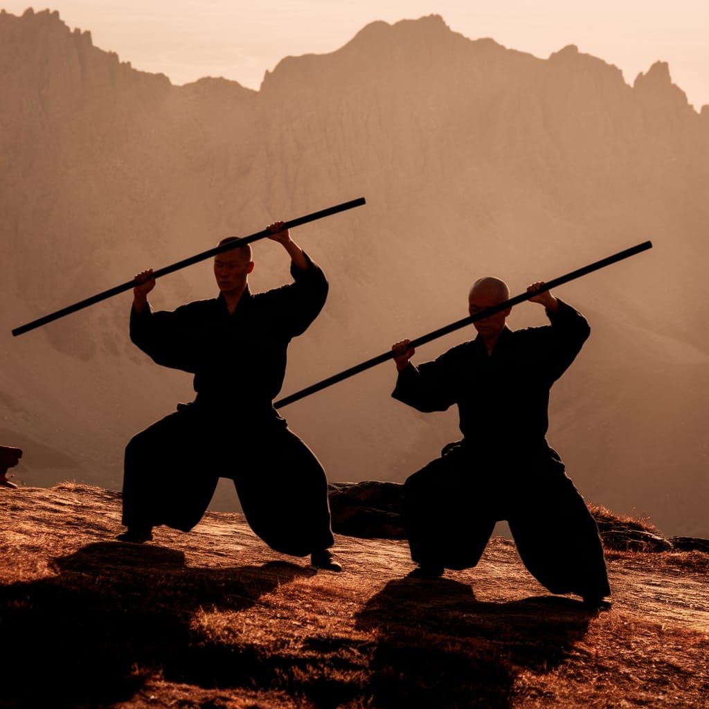 Monks Train with Chinese Weapons in Serene Mountain Dusk