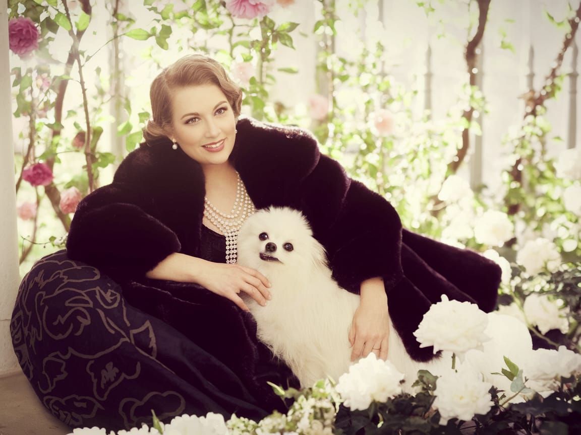 Elegant Lady in Mink Sable Coat with Pomeranian in Rose Gard...