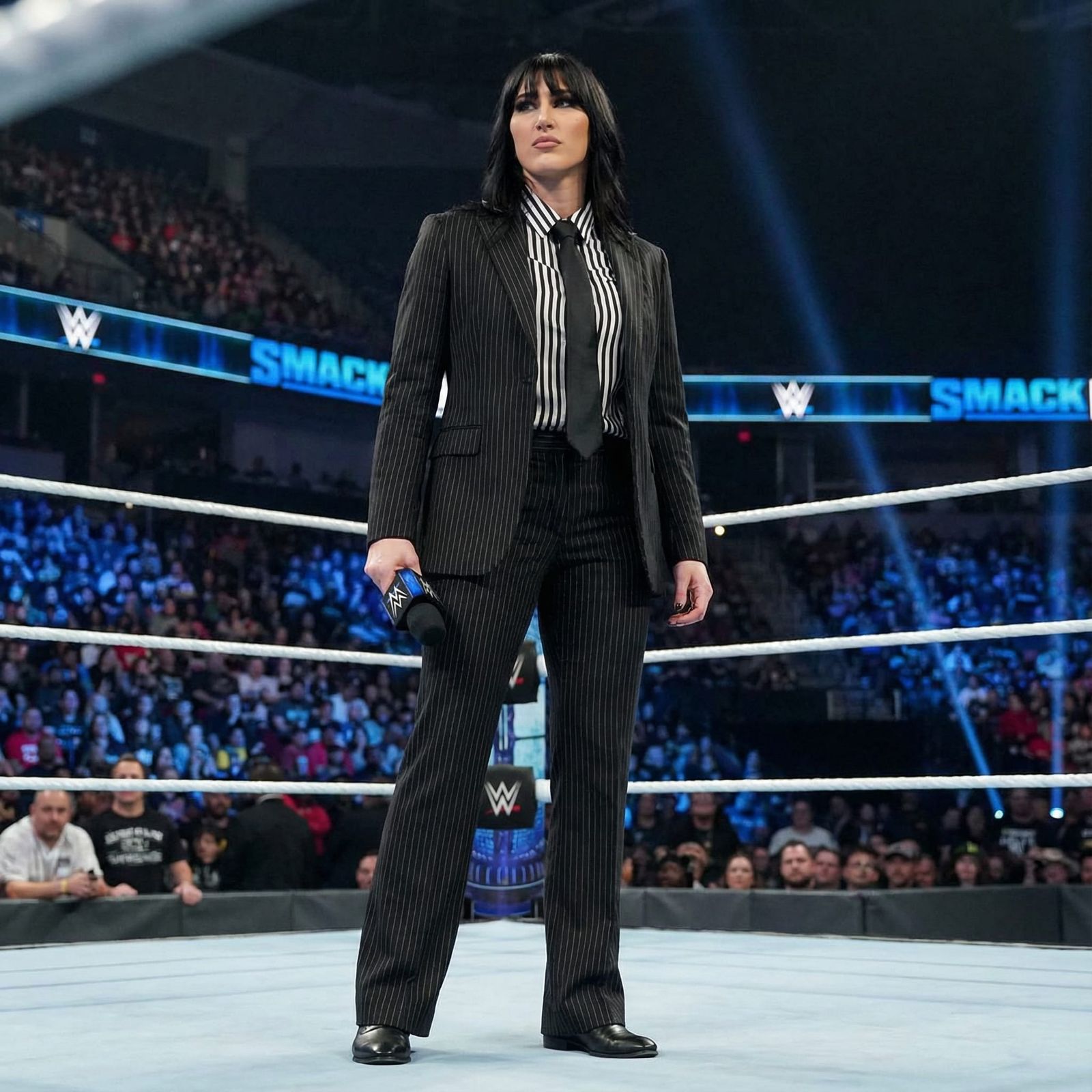 WWE Diva Commands Wrestling Ring with Microphone