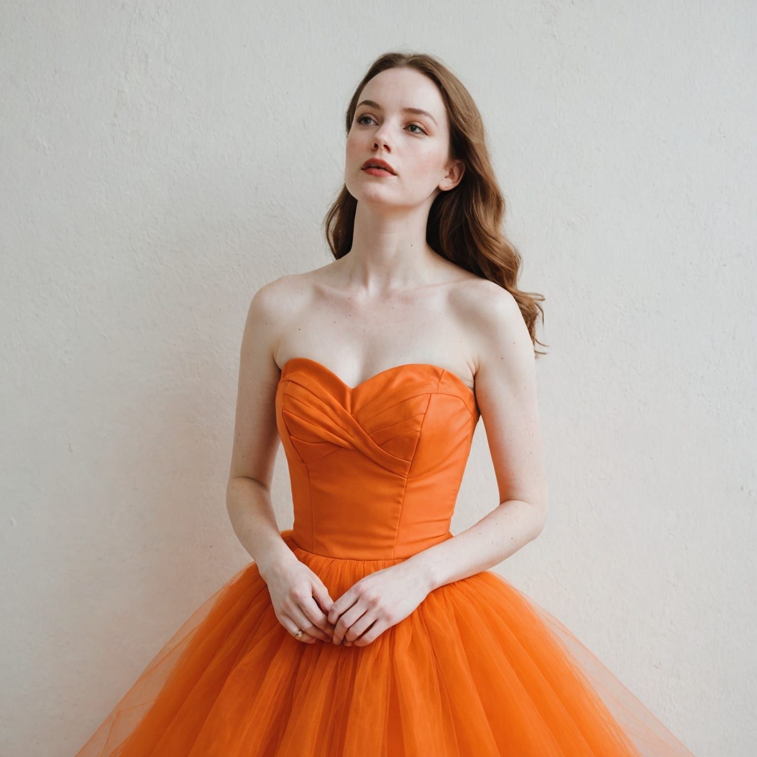 Woman in Orange Tutu Dress Against White Wall