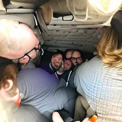 Podcasters Packed in a Van: AI Concept