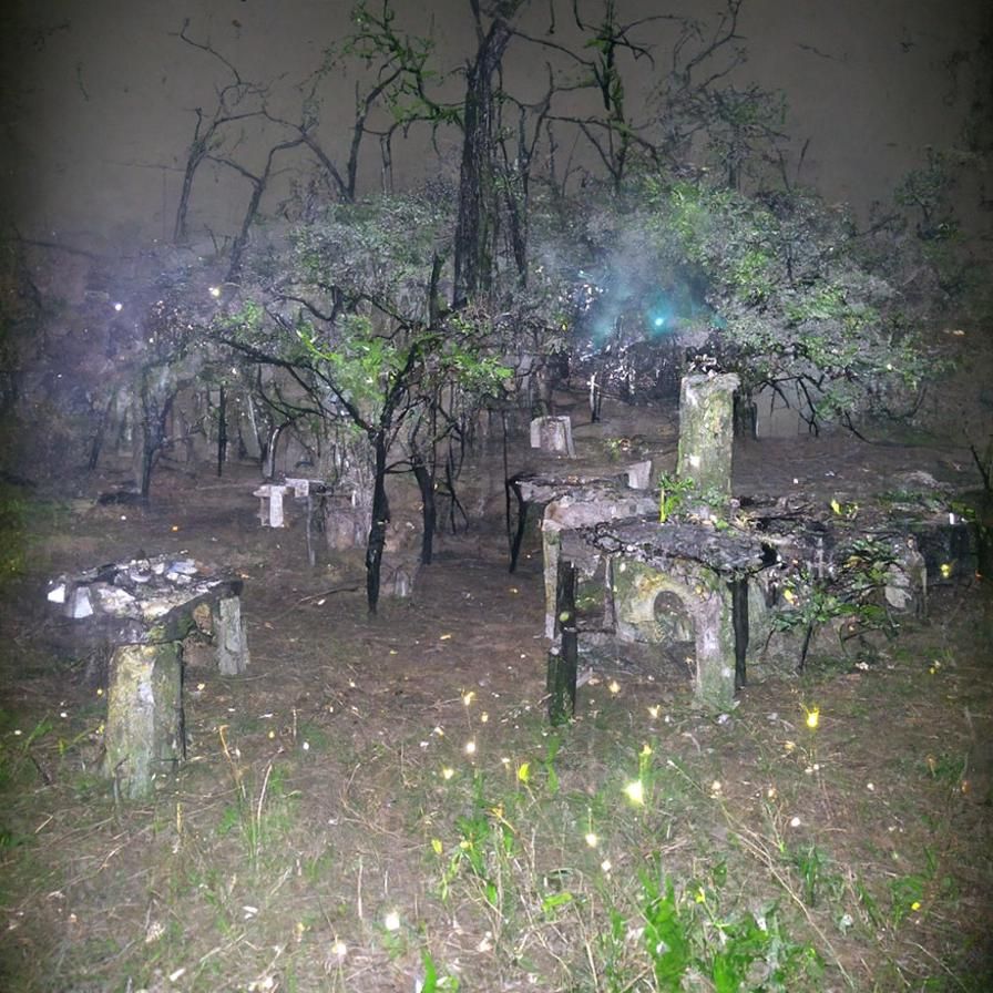 Haunted Graveyard in Misty Oak Forest at Night