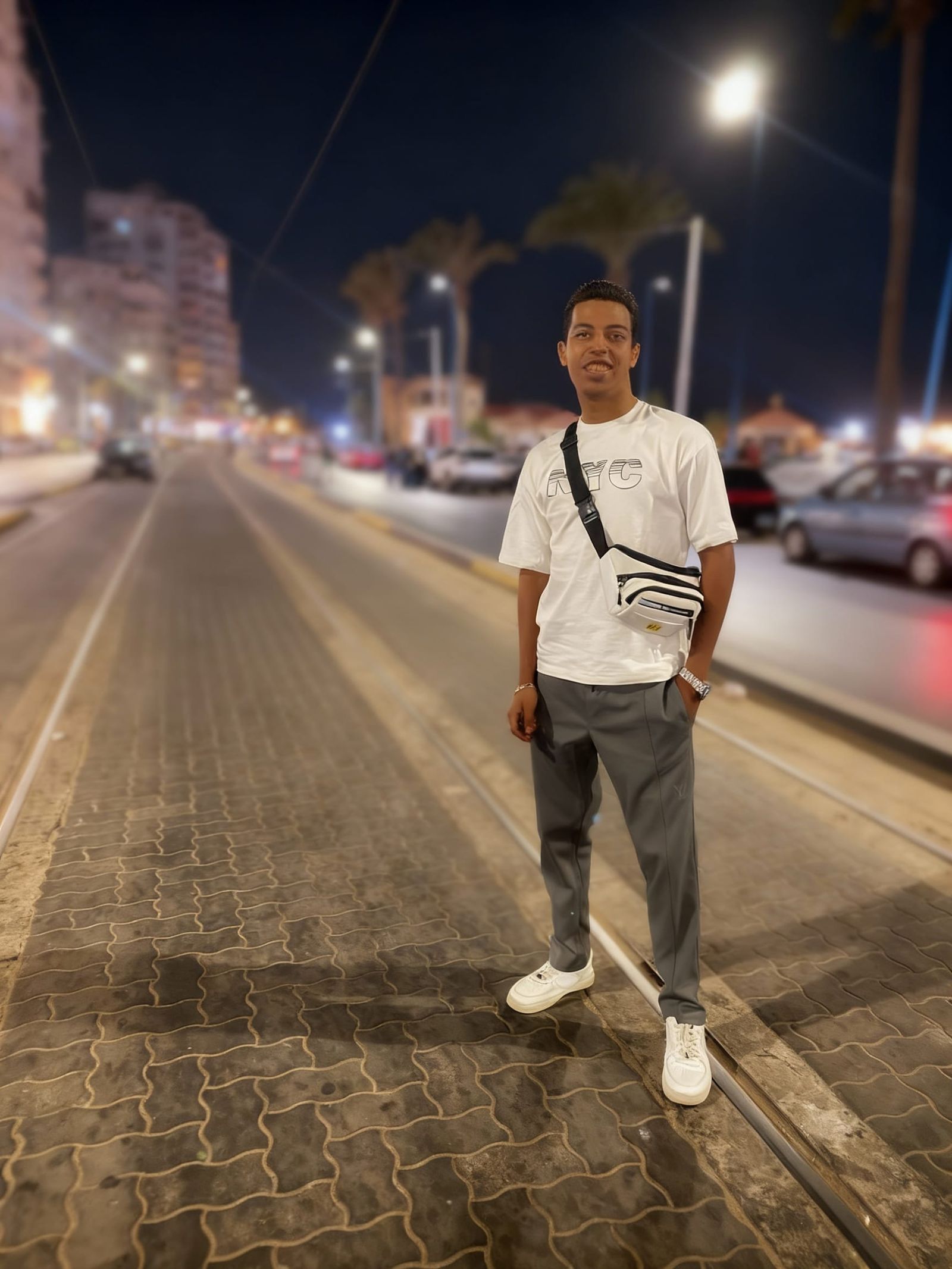 Realistic Night Portrait of a Young Man in City