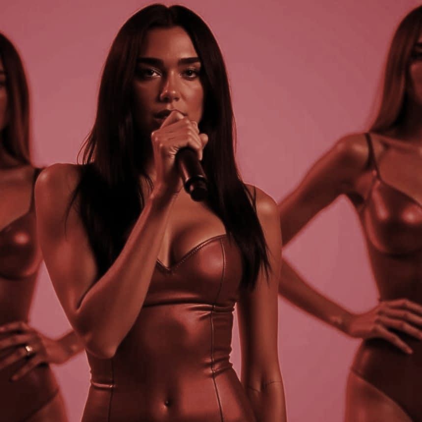 Singer in Red Dress on Stage in Concert