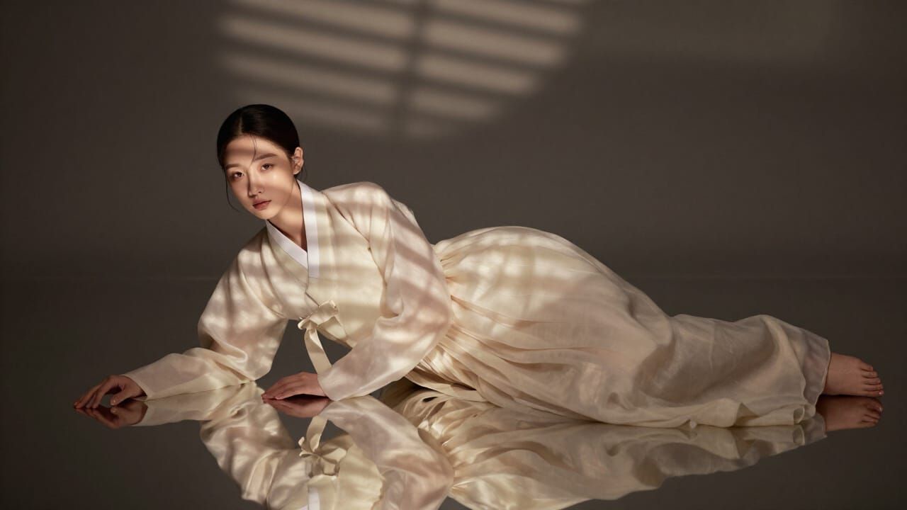 Korean Model in Ivory Hanbok with Dramatic Shadows