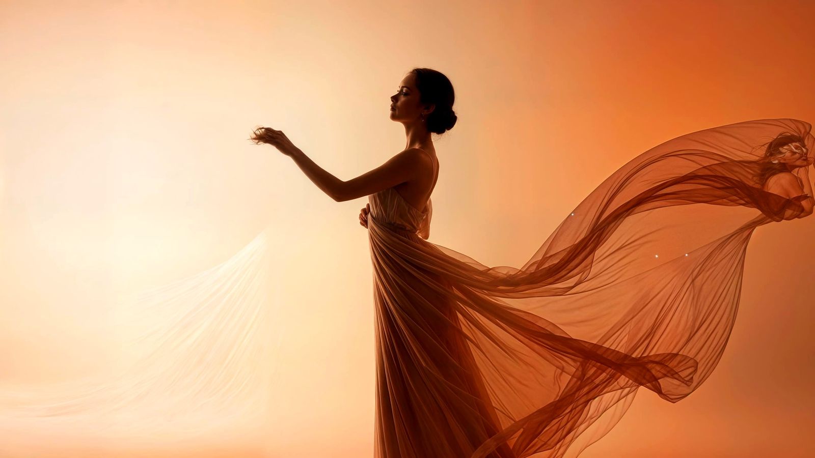 Elegant Woman Silhouette in Flowing Dress with Warm Gradient