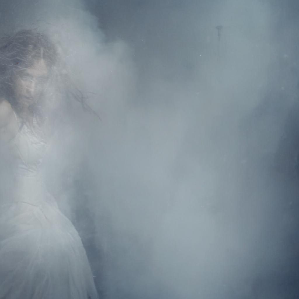 Ethereal Woman in Abandoned Room