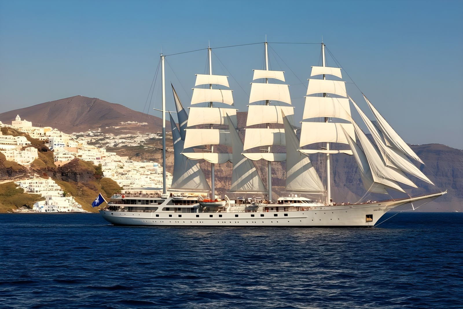 Majestic Sailing Yacht Enters Santorini's Picturesque Calder...