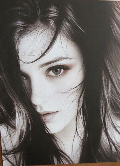 Very Beautiful feminine 24 year Caucasian woman with long dark hair pale white beauty skin and gorgeous striking hazel eyes that will make y...