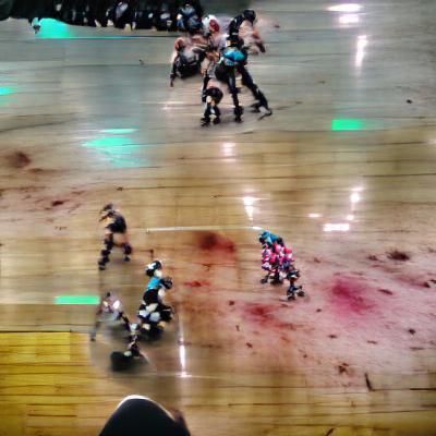 Watching a violent roller derby match