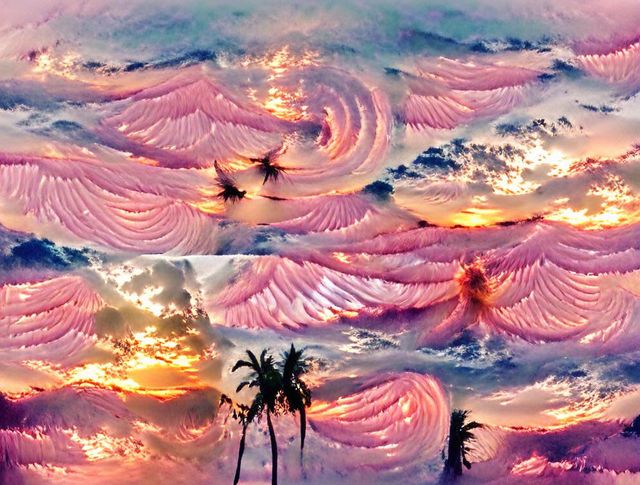 Pink effervescent sunsets morphing into sunrises among an infinite spiral of opalescent angels