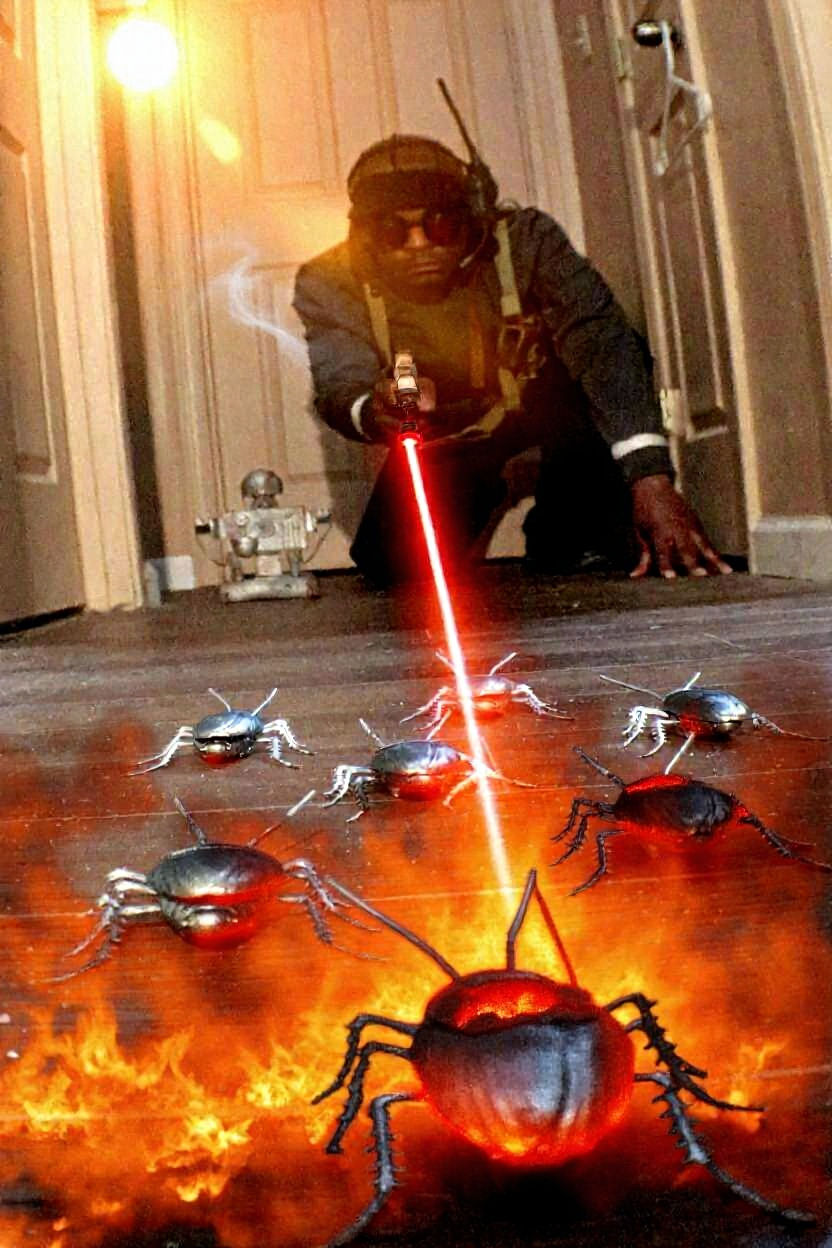 sandoval wolf shoots laser weapon at metallic roaches