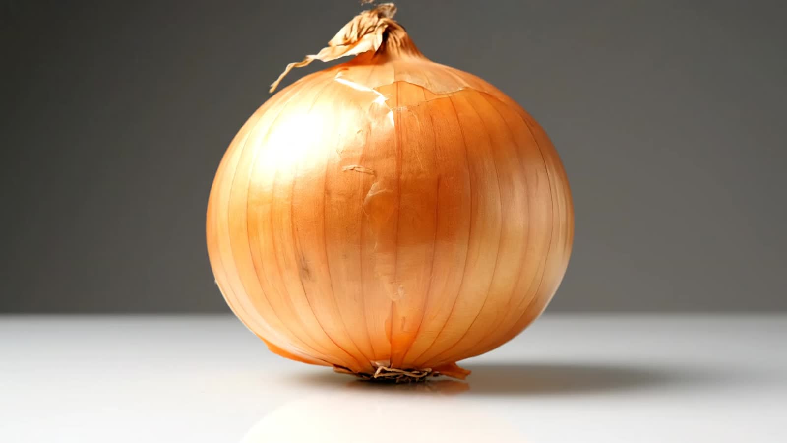 A onion that peals itself to reveal a lettuce that peals itself to reveal a strawberry